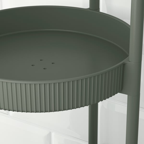 Roheline, ümmargune, mitmetasandiline detailse disainiga käru, mis näitab kvaliteetseid materjale ja meisterlikkust.