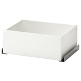 Valge KOMPLEMENT sahtel, ristkülikukujuline, mille allosas on metallklambrid. See on minimalistlik ja mõeldud riiete korraldamiseks.