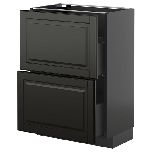 Kaasaegne must köögiseade siledate sahtlite ja kapiga.