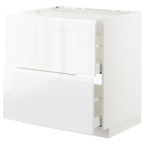 Valge läikiv köögikapp, METOD seeria, integreeritud käepidemete ja sileda puidust välimusega.