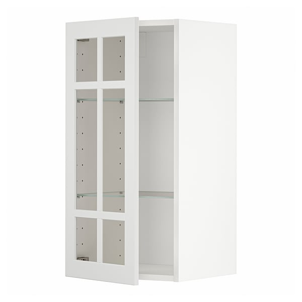 Valge METOD köögikapp klaasuste ja riiulitega.