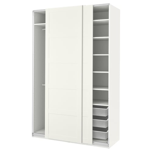 Valge ikea PAX riidekapp lükanduste ja riiulitega.