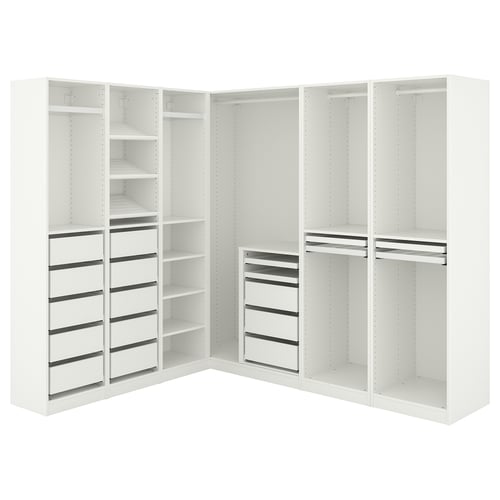 Komplektis on nurgakonfiguratsioonis valge ikea PAX garderoob, millel on riiulid, sahtlid ja riputusruum.