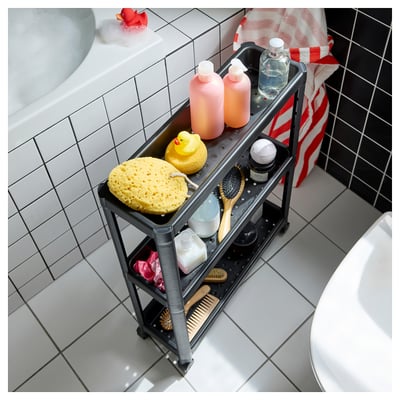 Must kolmekorruseline plastikust ratastel hoiukäru.