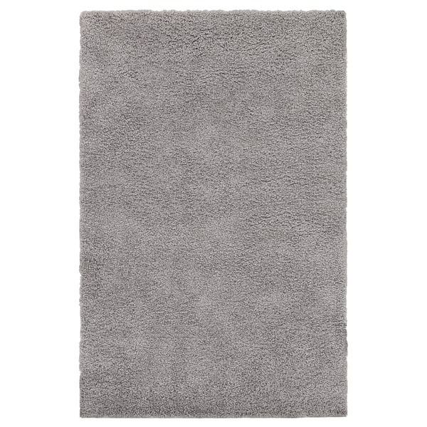 Grey ÄRENDE rug, soft, shaggy, sound-absorbing.