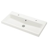 A white, rectangular BACKSJÖN sink with a modern design, made of crushed marble, designed for a sleek look.