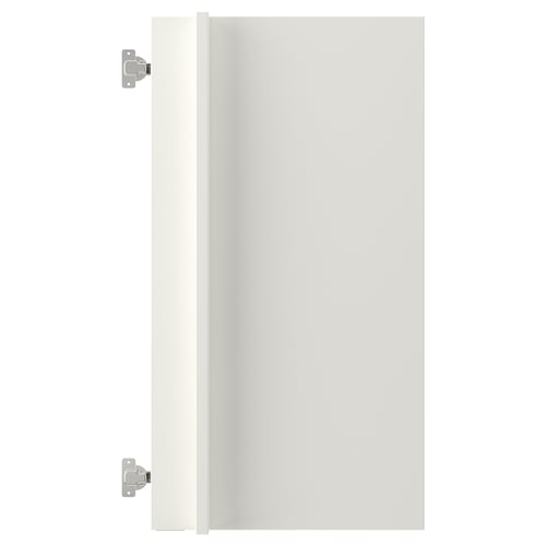 ENHET cabinet door in white, made from particleboard and plastic edging, with visible hinges, rectangular shape.