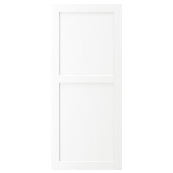 A white ENKÖPING cabinet door with a simple, rectangular design. The door has a vertical wooden texture and is framed, giving it a classic look.
