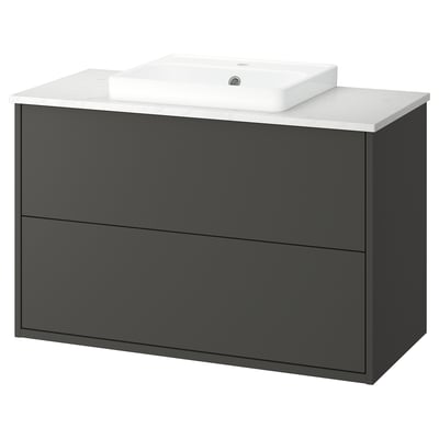 Modern black bathroom cabinet with marble countertop and white basin.