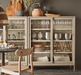 IDÅSEN Cabinet with sliding glass doors, beige, 120x140 cm