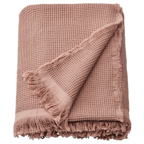 KLOTSTARR throw blanket, pale pink, waffle texture, 80% cotton, 20% rayon, fringe edges.