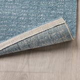 LANGSTED Rug, low pile, light blue, 170x240 cm