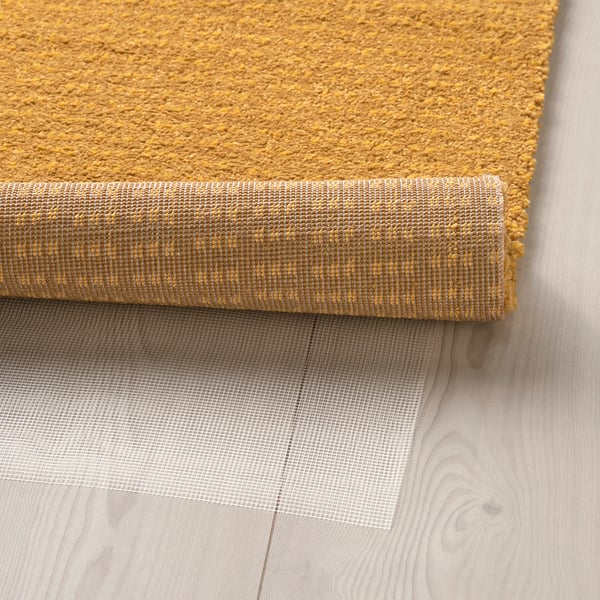 LANGSTED Rug, low pile, yellow, 133x195 cm