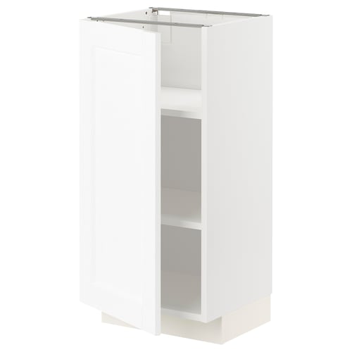 A white METOD kitchen cabinet with adjustable shelves.