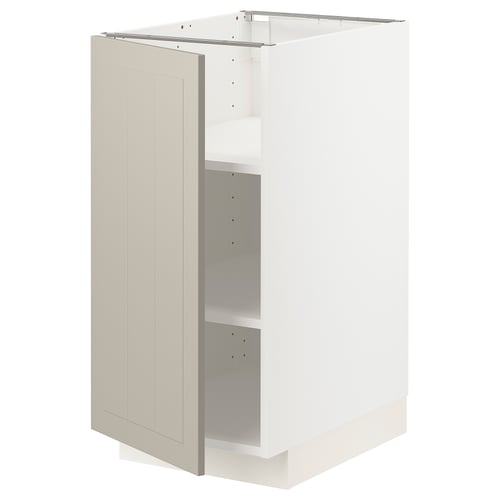METOD kitchen unit in beige with white cabinet.