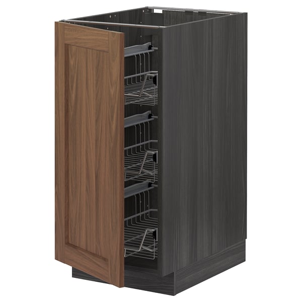 An open wooden cabinet with multiple metal shelves from the METOD kitchen system in walnut finish.