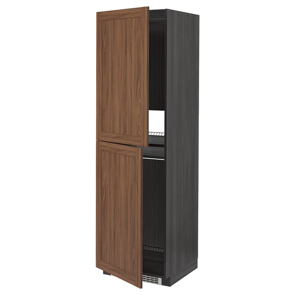 Displays a tall, dark brown wooden cabinet with two doors slightly ajar, revealing an open shelf inside.