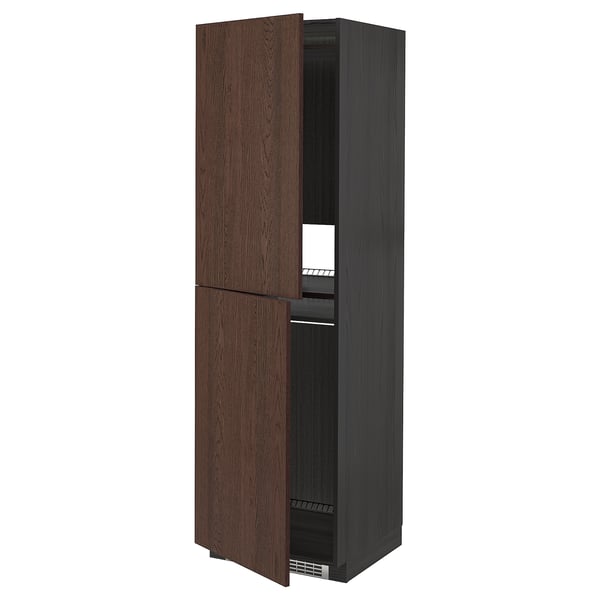 A tall dark brown wooden cabinet with two doors slightly open, revealing shelves inside.