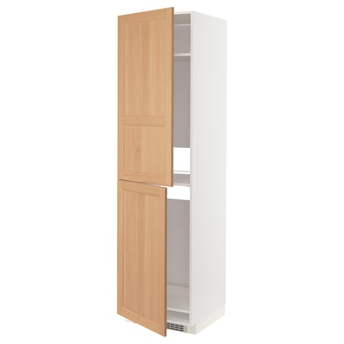 METOD kitchen cabinet with oak doors open showing shelves.