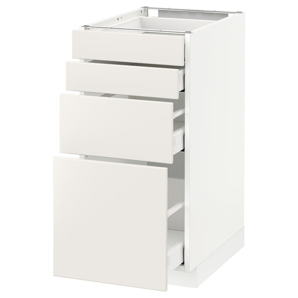 A white METOD kitchen cabinet with three drawers and an open compartment. Its modern, rectangular, and smooth lines.