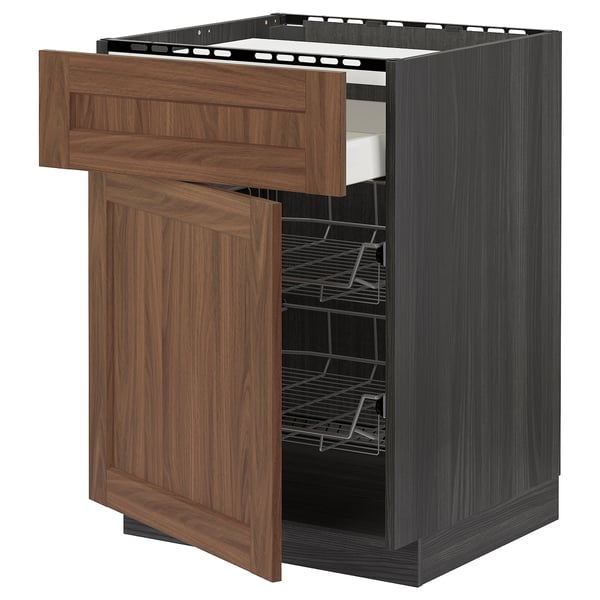 Wooden kitchen cabinet with drawer, dark finish, wire racks, metal handle.