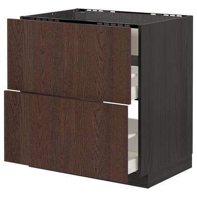 Brown ikea METOD kitchen unit with wooden drawers.