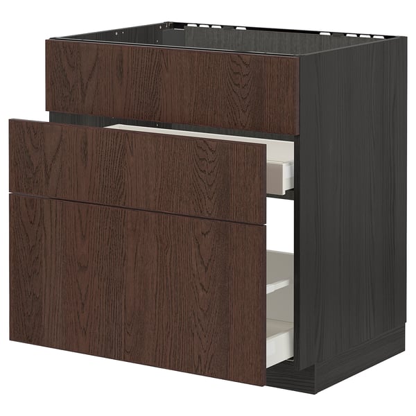 Dark wood-colored METOD kitchen cabinet with oak veneer and pull-out drawers.