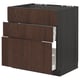 Brown METOD kitchen cabinet with wooden drawers.