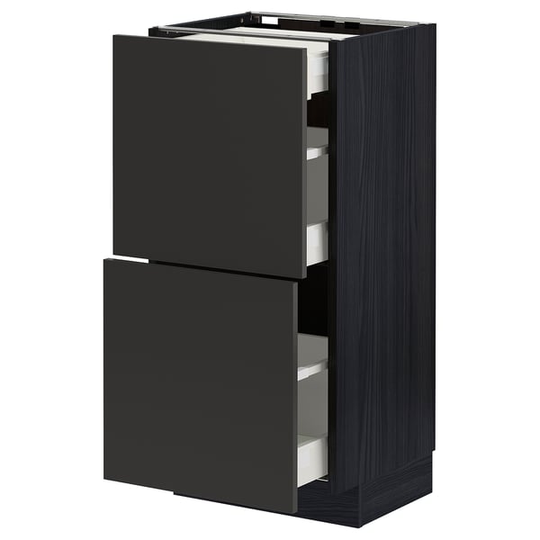 A black METOD kitchen cabinet with two drawers and two doors.