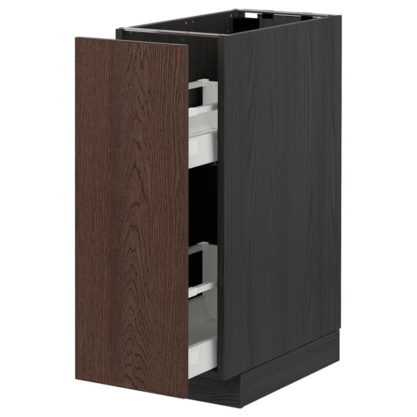 Dark brown kitchen cabinet with oak veneer, solid wood edge, and pull-out drawer, part of the ikea METOD system.