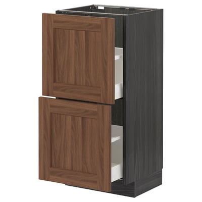 An open brown METOD kitchen cabinet with two drawers. This modern design wooden-style fronts and metal drawer runners.