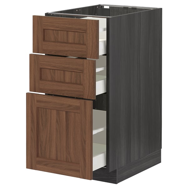METOD kitchen unit with 3 walnut drawers, dark grey base, wooden finish.