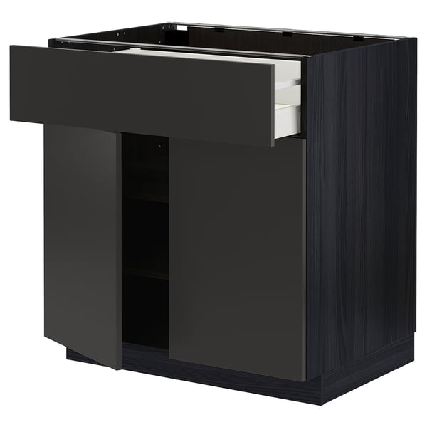 Black kitchen unit: METOD by IKEA, drawers, cupboard, sleek modern design.