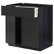 Black kitchen unit: METOD by IKEA, drawers, cupboard, sleek modern design.
