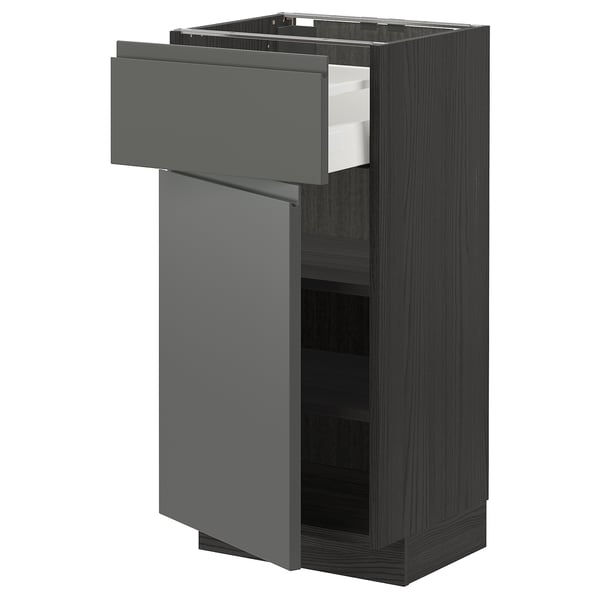 Depicts a black-brown kitchen cabinet unit with a dark grey drawer and door, featuring a sleek, modern design.