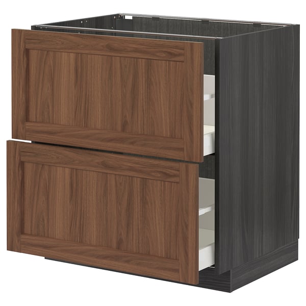 This image shows a dark wood-colored kitchen cabinet from the METOD system, featuring two drawers with a classic, sturdy design.