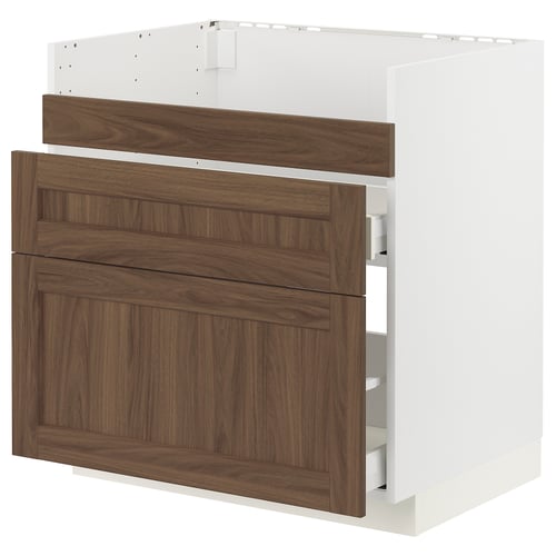 This image shows an ikea METOD kitchen cabinet with walnut-effect drawers and a white base, featuring sleek, modern design with a classic wooden look.