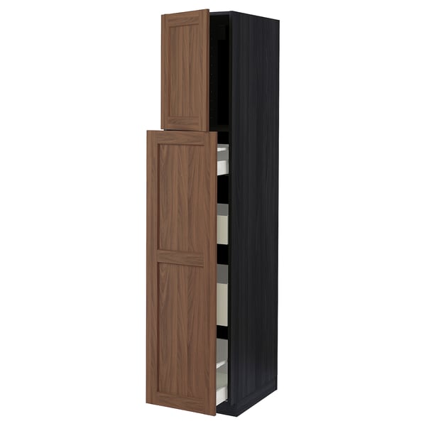 Dark wood ikea METOD kitchen cabinet with walnut finish, slim design, partially open drawer.