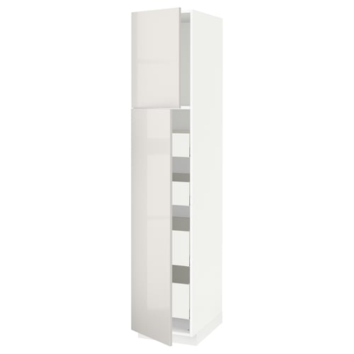 A white METOD kitchen cabinet with high gloss finish and multiple shelves. It stands tall with a sleek, rectangular shape and has a modern design.
