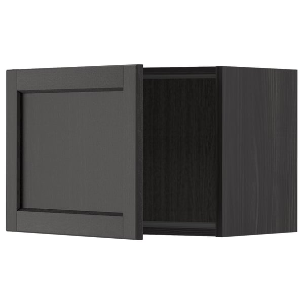 Modern black wood wall cabinet with square door and bevelled edges.