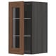 Wooden and glass kitchen cabinet with open door, dark finish.