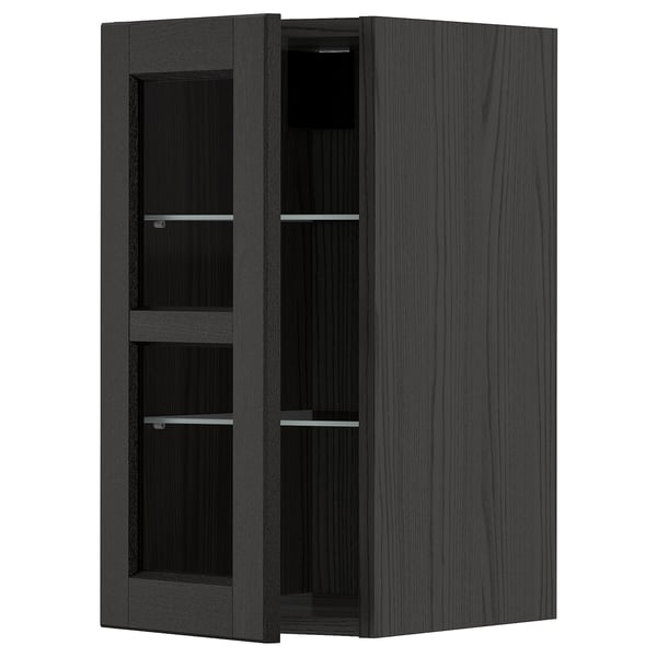 Modern black METOD kitchen cabinet with glass doors and adjustable shelves.