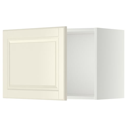 A white METOD kitchen cabinet with a bevelled edge door.