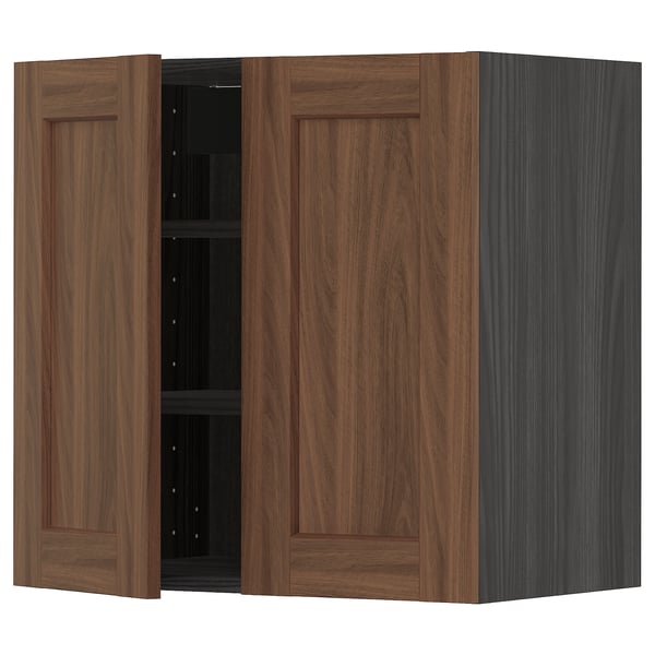 Ikea METOD kitchen unit in walnut brown, featuring two wooden doors, one with shelves inside. Classic, warm design.