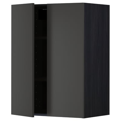 A dark grey METOD kitchen cabinet with a wooden grain design and a single open door revealing shelving and adjustable pins.