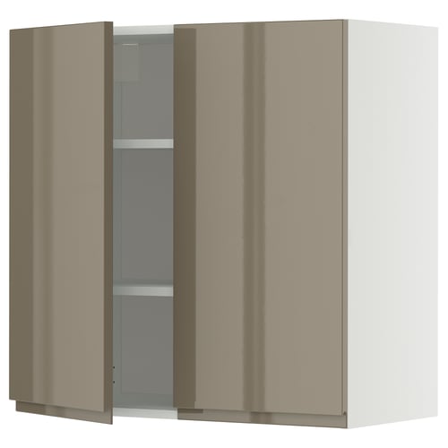 Modern high-gloss beige kitchen cabinet with sleek handles and adjustable shelves.