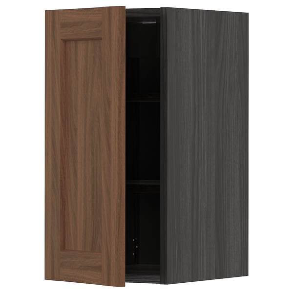 METOD kitchen cabinet with walnut wooden door and dark frame.