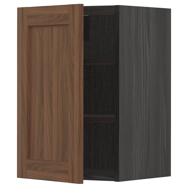 Walnut-colored METOD kitchen cabinet with adjustable shelf, rectangular shape, and simple design. One door open.
