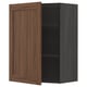 Image depicts an open METOD kitchen cabinet with walnut-colored wooden door, dark grey frame, and adjustable shelf.