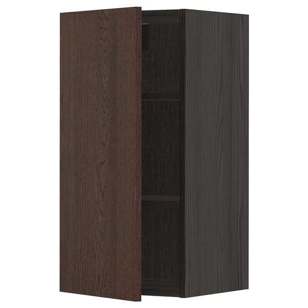 A dark brown METOD wall cabinet with a single door and shelf.
